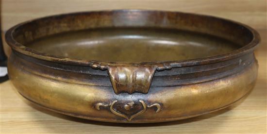 A Uruli bronze 19th century temple bowl handle to handle 45cm